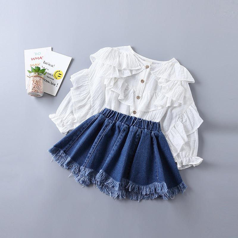 Children's Clothing In a Shirt And Denim Skirt