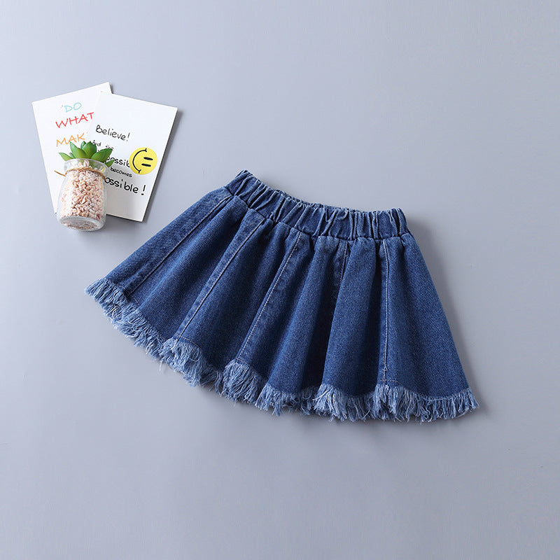Children's Clothing In a Shirt And Denim Skirt